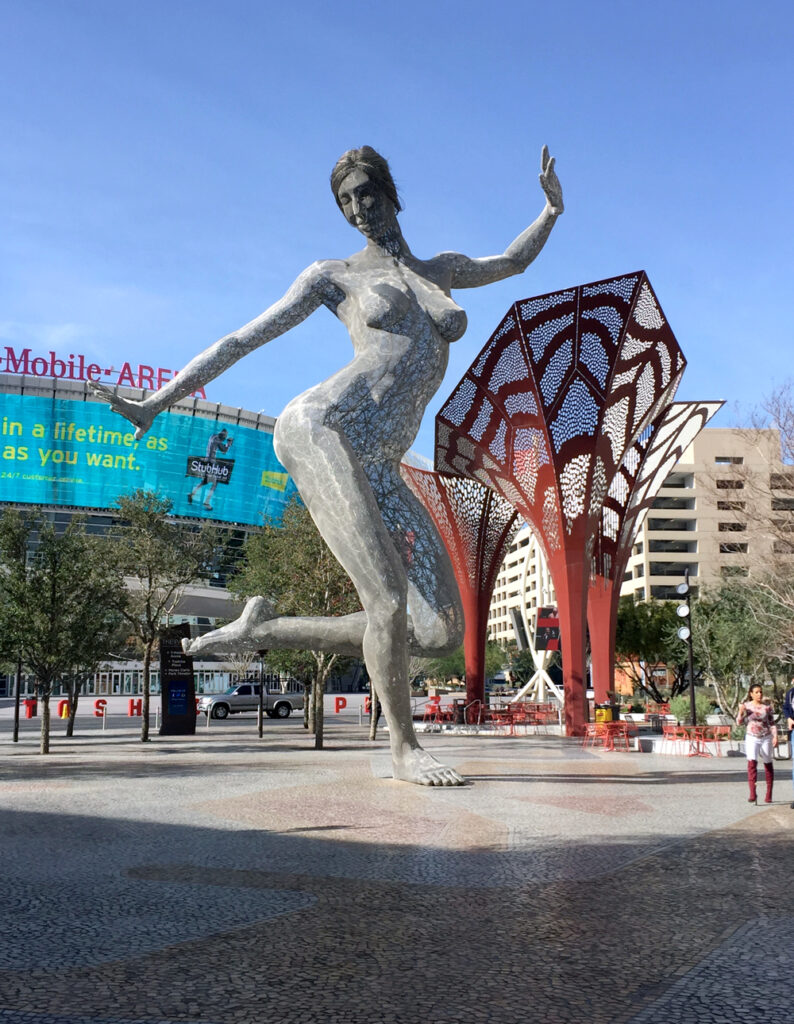 Large wire sculpture of lady dancing