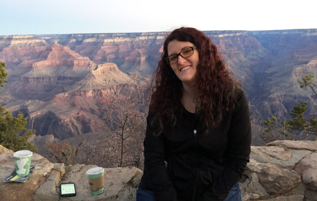 Female in front of Grand Canyon